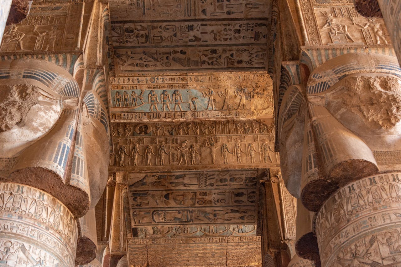 Detailed view of hieroglyphs and columns in the ancient Dendera Temple in Egypt.